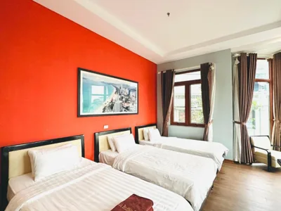 Deluxe-Dreibettzimmer — Hanoi Buffalo Hostel